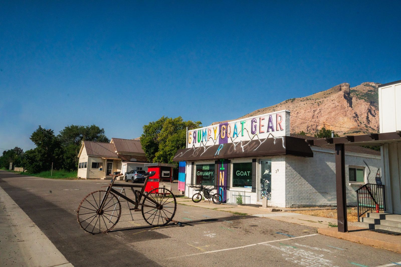 Grumpy Goat storefront with a vintage bicycle out front